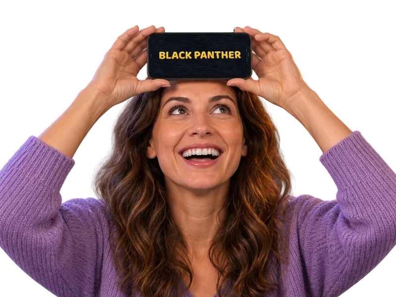 Mum holding the phone to her forehead showing BLACK PANTHER